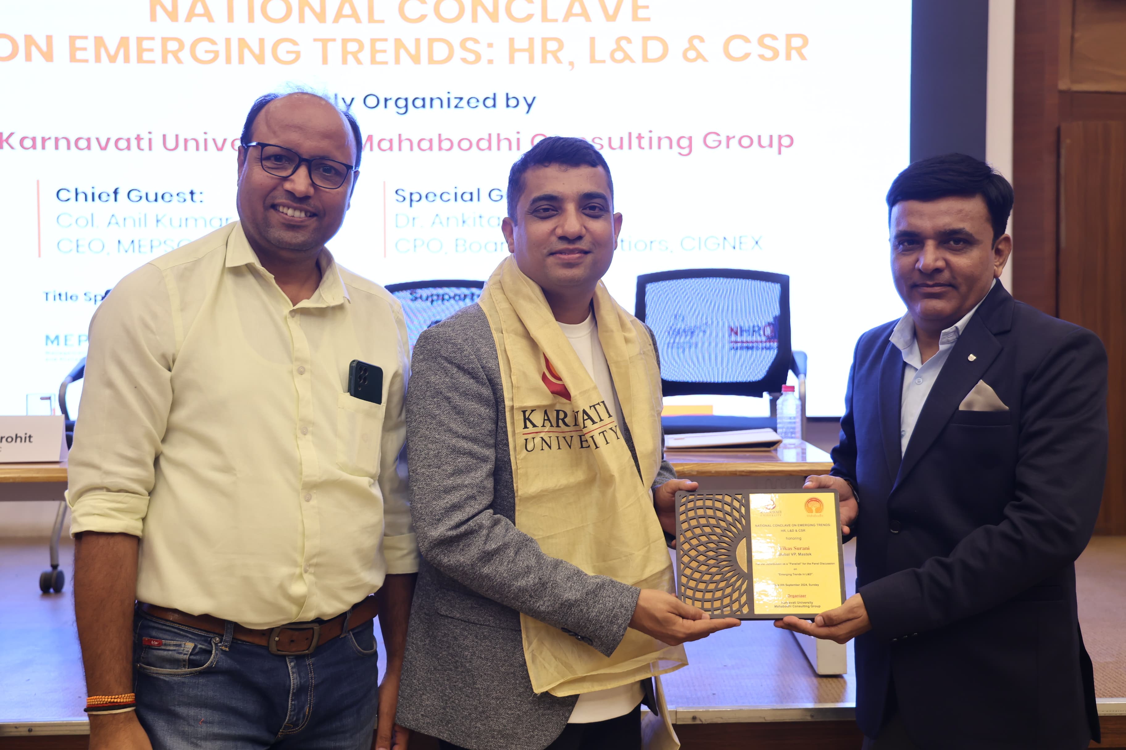 Vikas Surani receiving an award